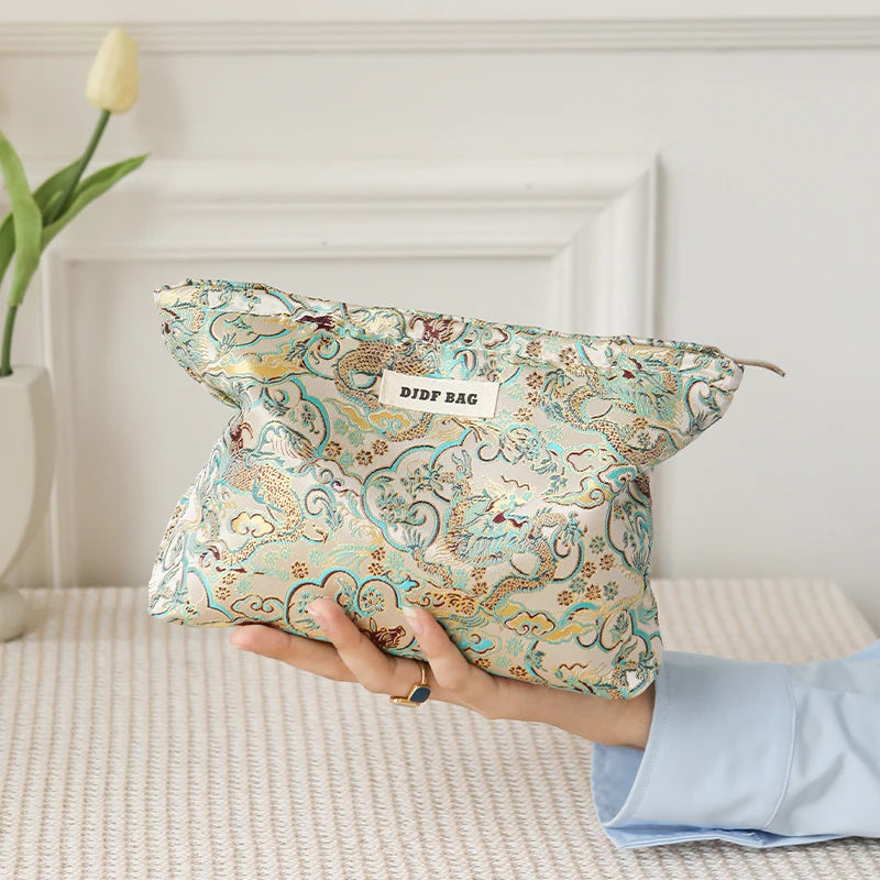 Gold embossed flower feminine makeup bag, large capacity cosmetics, sanitary napkin storage bag, portable travel toiletry bag